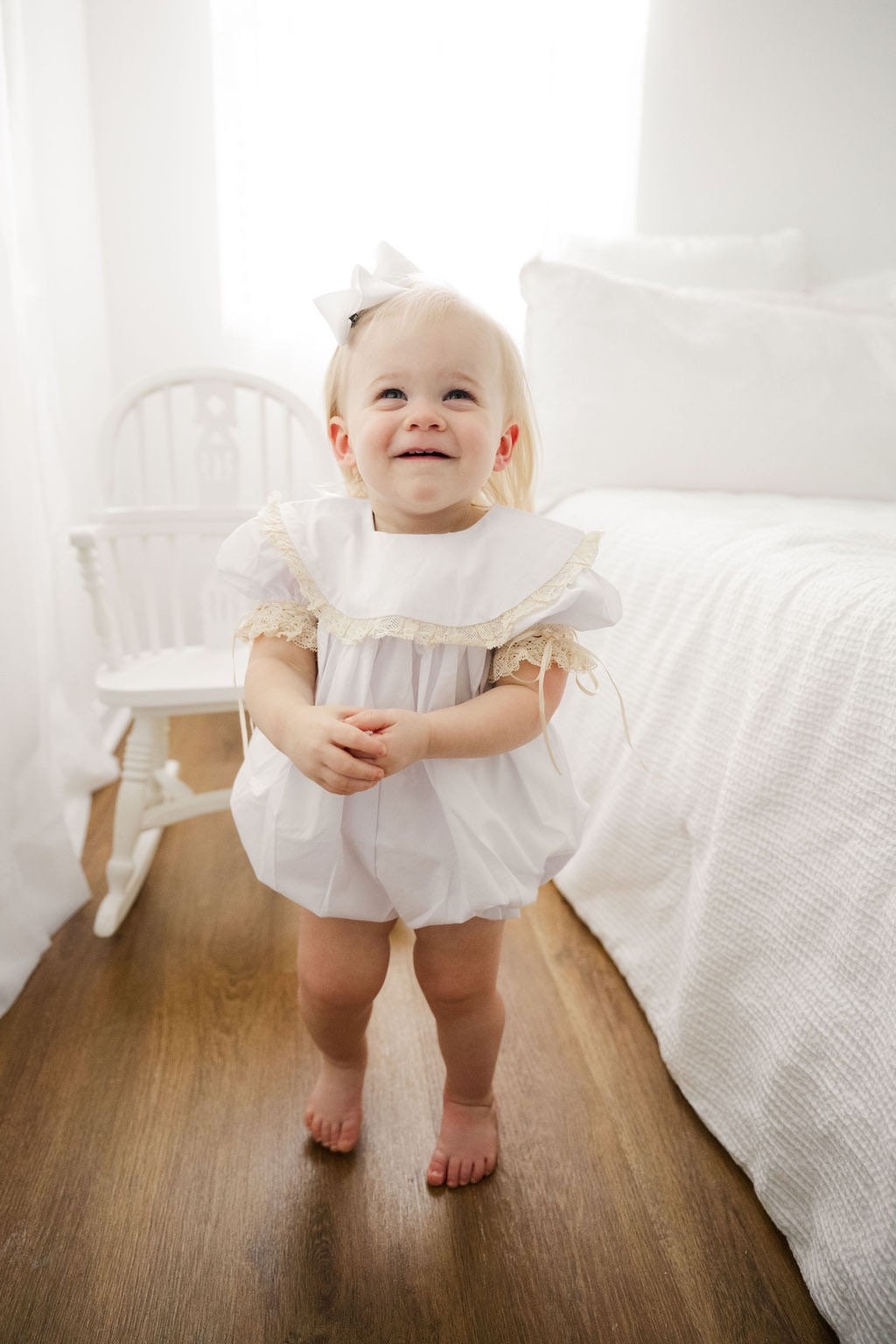 White bubble romper for best sale baby girl